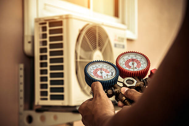 Professional Air Conditioning Service technician working in Bear Creek, AL